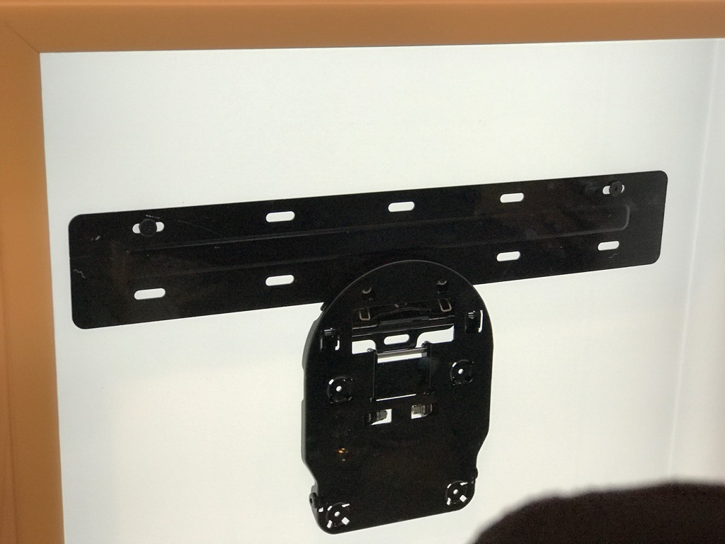 This is Samsung's "no gap" bracket which allows their TVs to sit flush against the wall. It's actually really impressive!